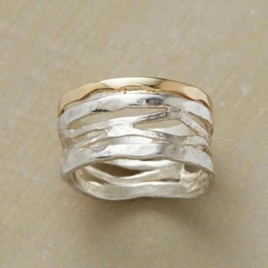 Anillo hueco de oro y plata vintage