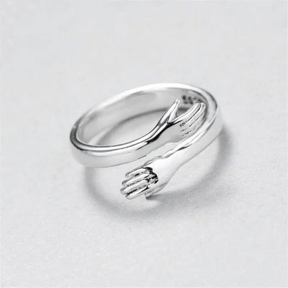 Anillo ajustable de abrazo de plata